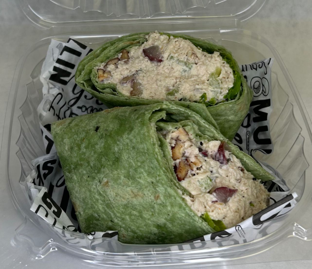 Chicken salad wrap in a to-go box