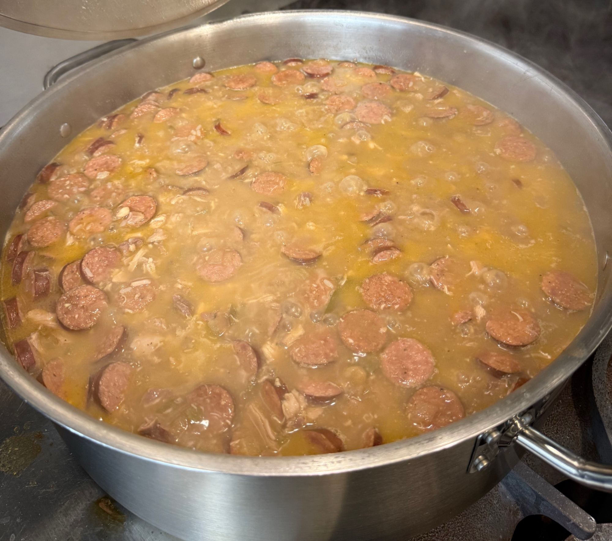 A pot of sausage and corn chowder